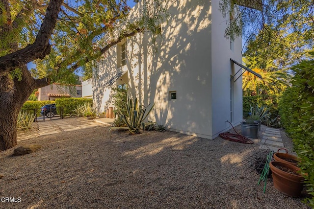 view of home's exterior with a patio area