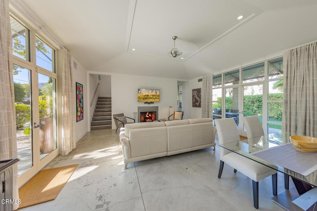 living room with a healthy amount of sunlight and french doors