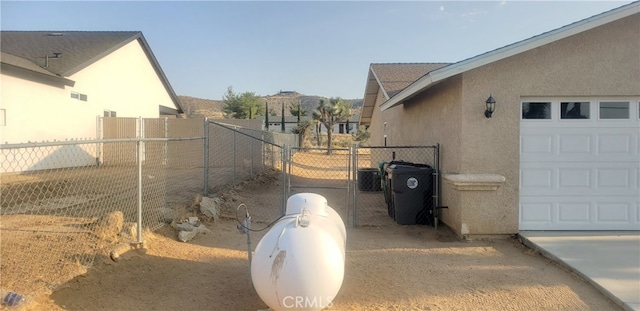 view of yard featuring a garage