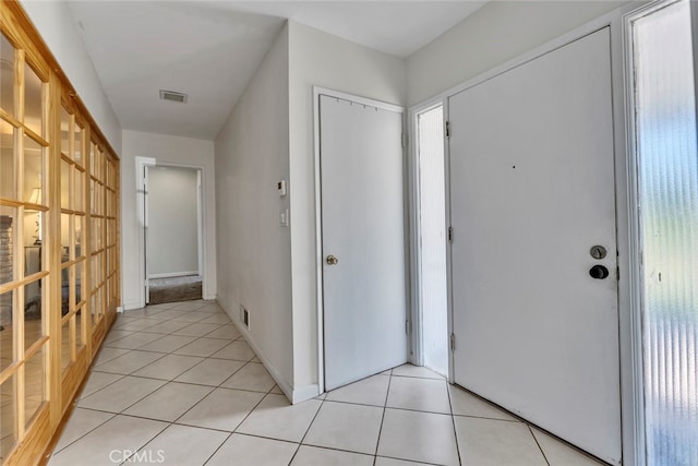 view of tiled foyer entrance