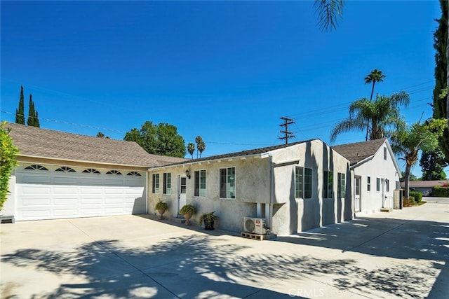 ranch-style house featuring a garage