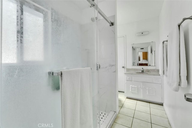 1021 S Lark Ellen Ave, West Covina, CA 91791 - full bathroom with a marble finish shower, tile patterned floors, and vanity