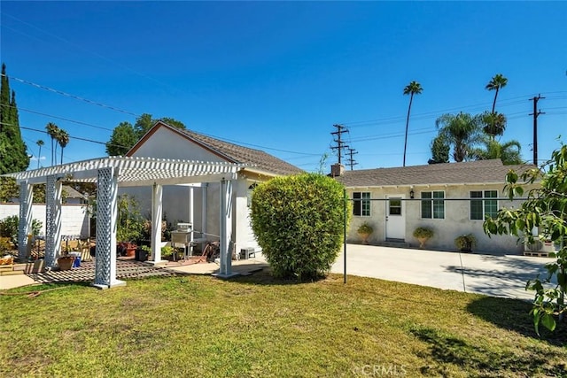 1021 S Lark Ellen Ave, West Covina, CA 91791 - rear view of property with a yard, stucco siding, a patio, and a pergola