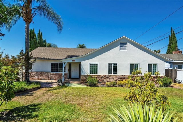 ranch-style house with a front yard