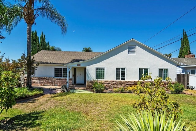 1021 S Lark Ellen Ave, West Covina, CA 91791 - view of front of property with a front lawn, fence, stone siding, and stucco siding