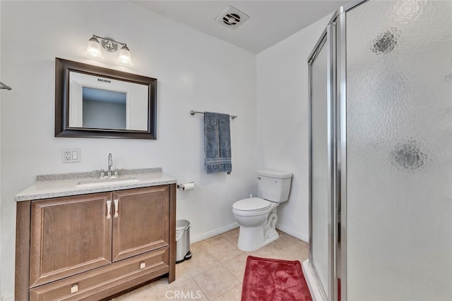 bathroom with walk in shower, vanity, toilet, and tile patterned floors