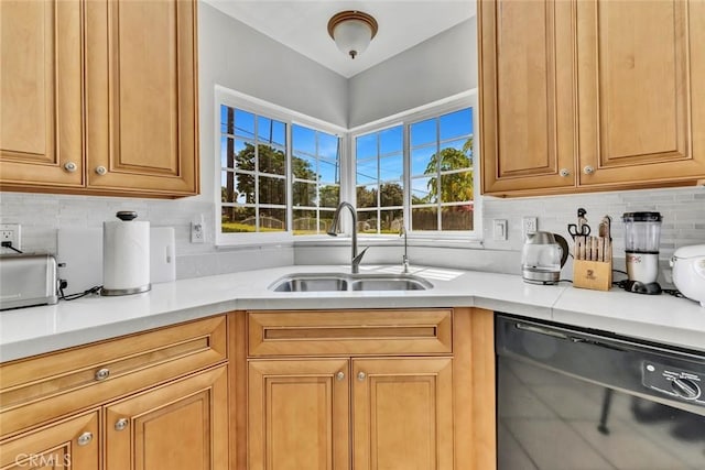 1021 S Lark Ellen Ave, West Covina, CA 91791 - kitchen featuring a sink, backsplash, light countertops, and black dishwasher