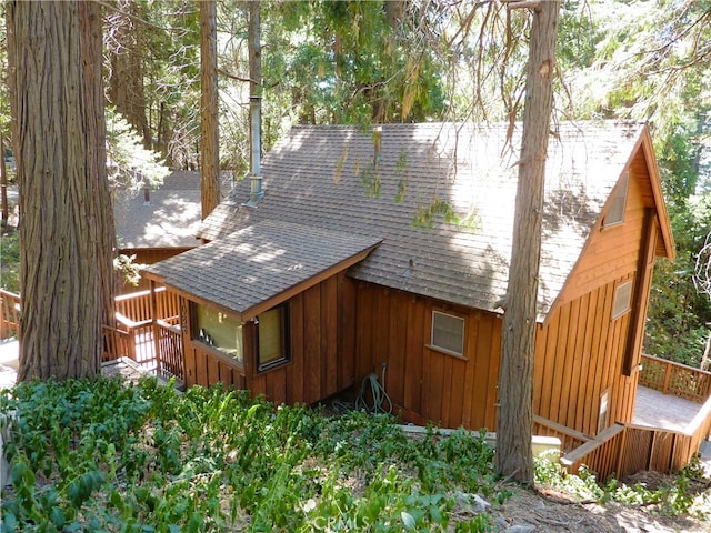 view of home's exterior featuring a deck