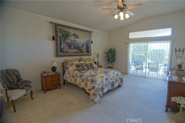 carpeted bedroom with access to outside, vaulted ceiling, and ceiling fan