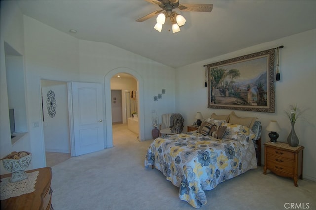 carpeted bedroom with lofted ceiling and ceiling fan