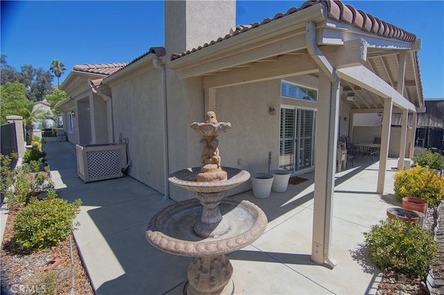 back of house with a patio area