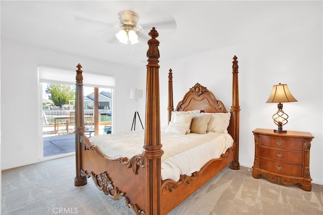 bedroom with access to outside, ceiling fan, and light colored carpet