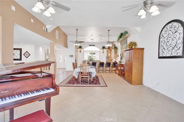 living room featuring light tile patterned floors and a ceiling fan