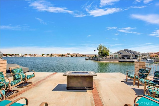 view of patio / terrace with a water view