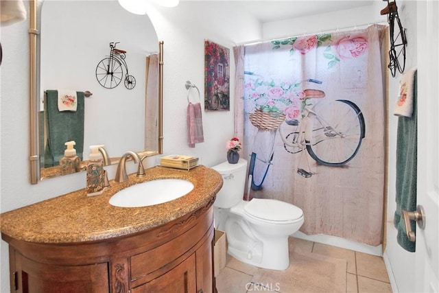 full bathroom with tile patterned floors, a shower with curtain, toilet, and vanity