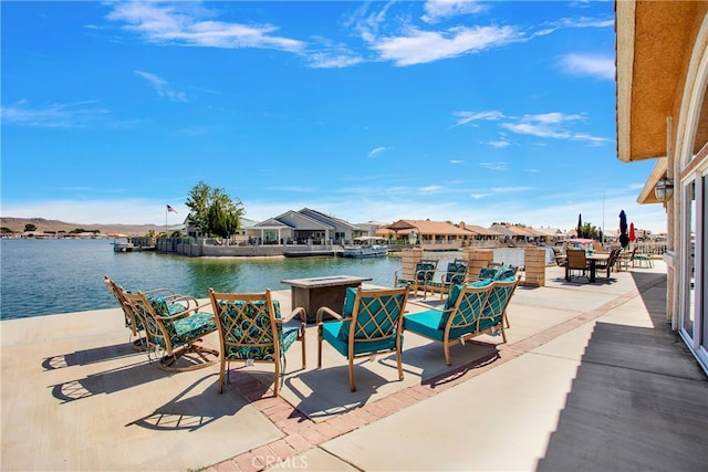 view of patio / terrace with a water view