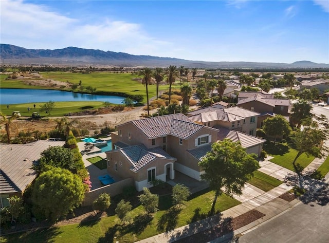 bird's eye view with a water and mountain view