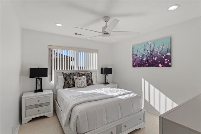 bedroom featuring ceiling fan and light hardwood / wood-style floors