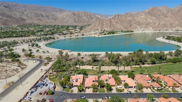 bird's eye view featuring a water and mountain view