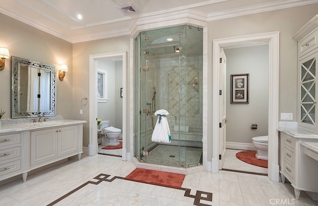 bathroom with vanity, a shower with shower door, ornamental molding, and toilet