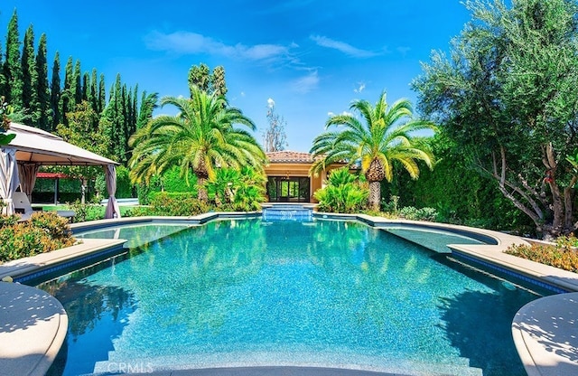 view of pool with a gazebo and a patio area