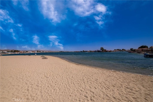 property view of water featuring a beach view
