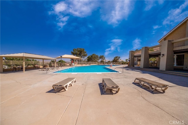 view of swimming pool featuring a patio area