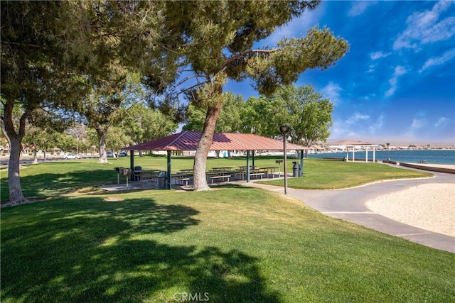 surrounding community with a gazebo and a lawn