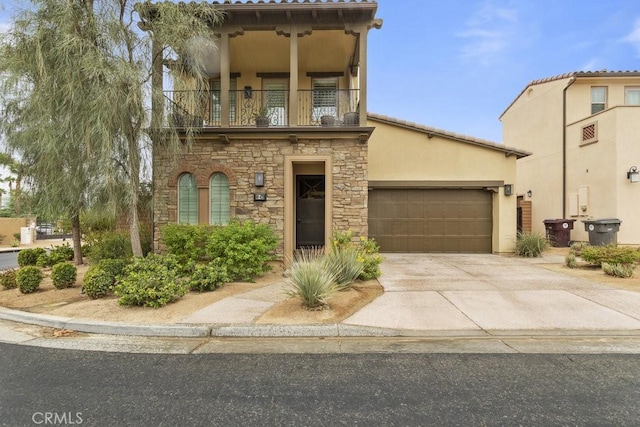 view of front of house with a balcony and a garage