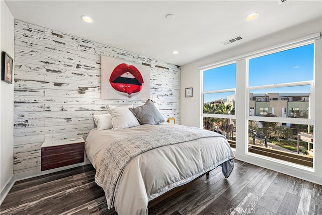 bedroom featuring dark hardwood / wood-style floors