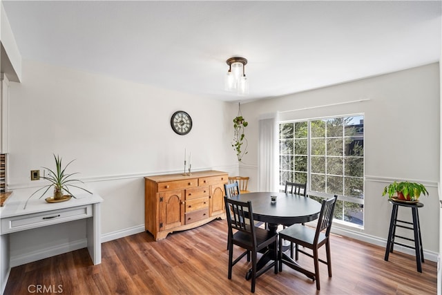 dining area featuring hardwood / wood-style flooring