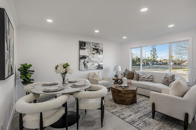 living room featuring ornamental molding and hardwood / wood-style floors