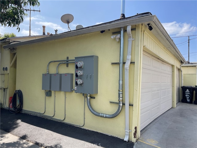 view of side of home with a garage