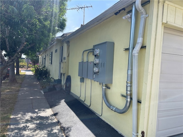 view of side of home with a garage