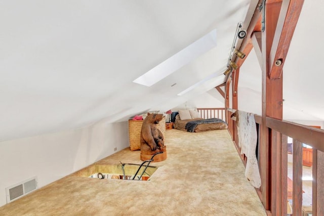 bonus room featuring carpet flooring and lofted ceiling with skylight