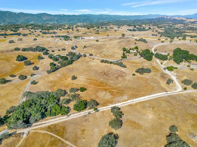 bird's eye view featuring a mountain view and a rural view