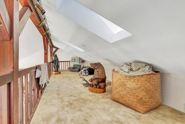 bonus room featuring vaulted ceiling with skylight and carpet floors