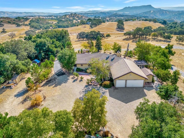 drone / aerial view featuring a mountain view