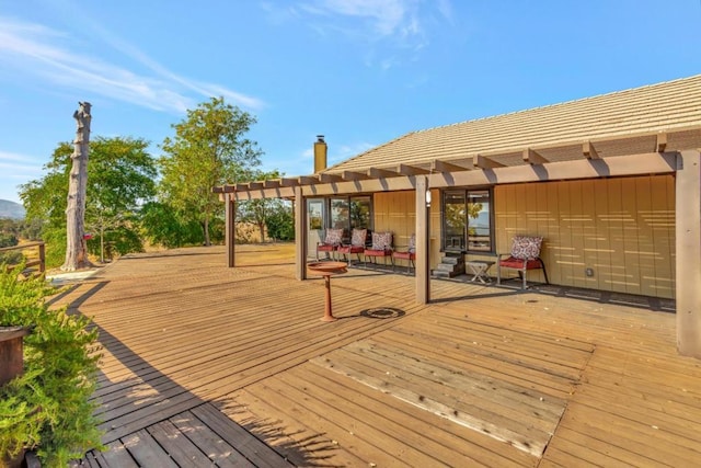 deck featuring a pergola