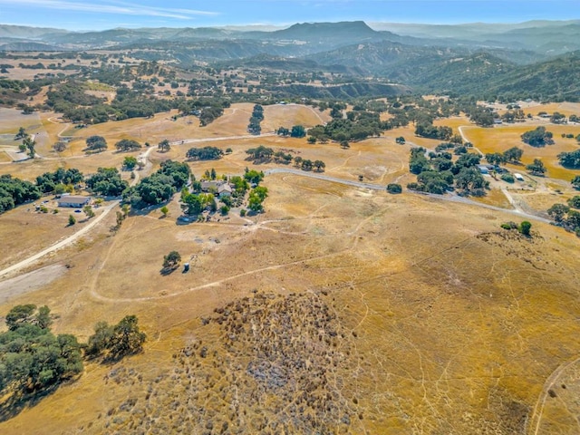 aerial view with a mountain view and a rural view