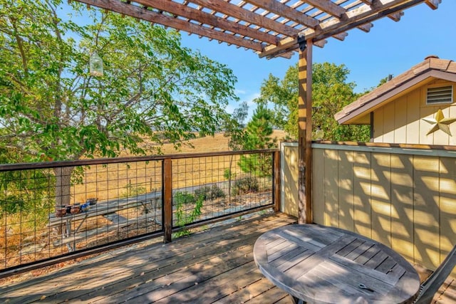 wooden terrace with a pergola