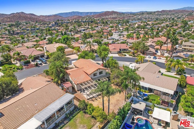 drone / aerial view featuring a mountain view