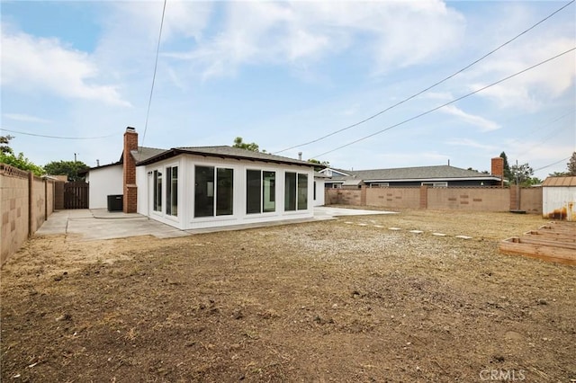 back of property featuring a patio area