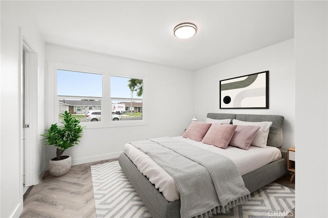 bedroom with light wood-type flooring