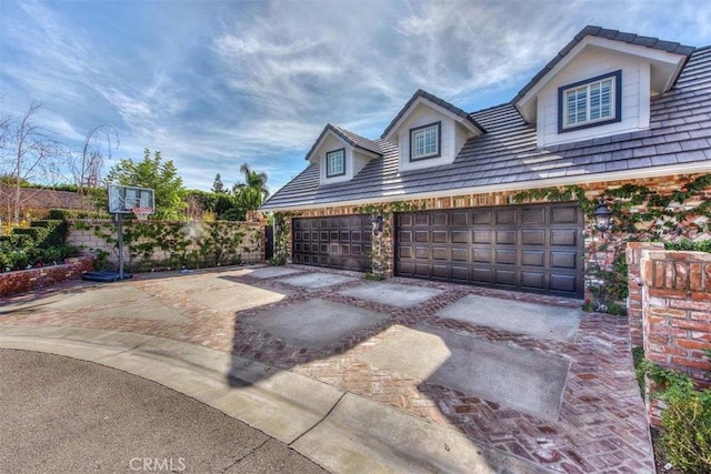 exterior space featuring a garage