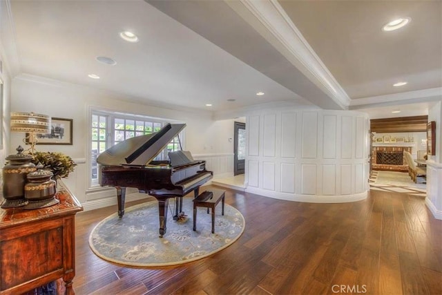 misc room with crown molding and hardwood / wood-style floors