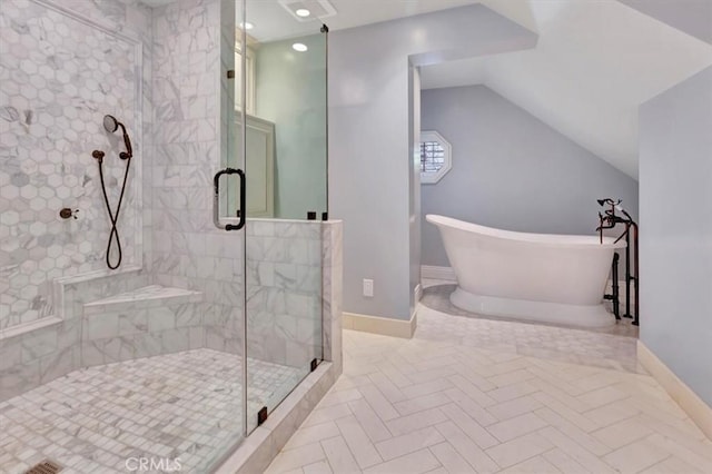 bathroom featuring separate shower and tub