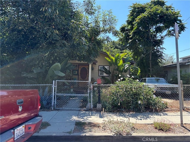2724 Queen St, Los Angeles, CA 90039 - obstructed view of property featuring a fenced front yard and a gate
