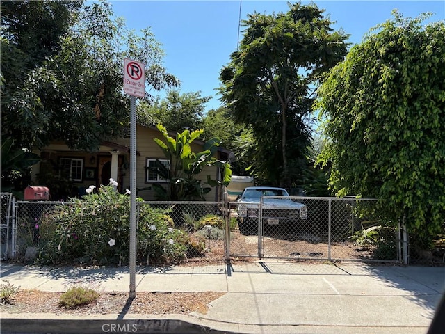 2724 Queen St, Los Angeles, CA 90039 - view of home's community with a fenced front yard and a gate