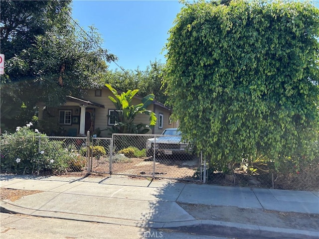 2724 Queen St, Los Angeles, CA 90039 - view of front of property featuring a fenced front yard, a gate, and concrete driveway